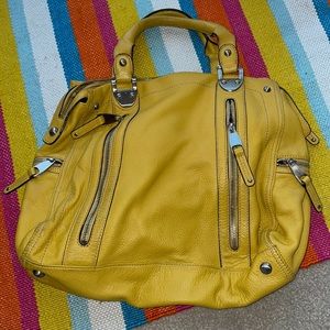 Yellow, bowling bag style B. Makowsky purse